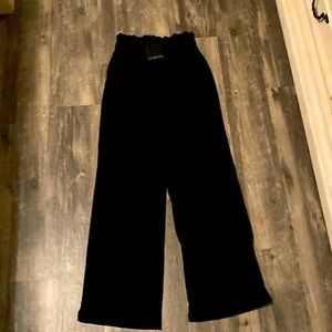 NWT black pull on pants. Ruffle at waist